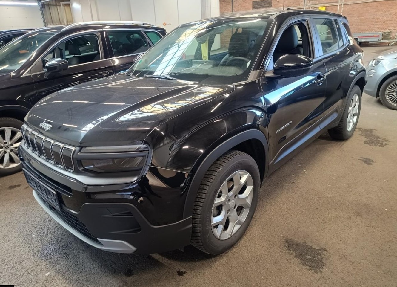 Jeep Avenger - 1.2 e-Hybrid Altitude Stoel en stuurverwarming/Electr achterklep. - AutoWereld.nl