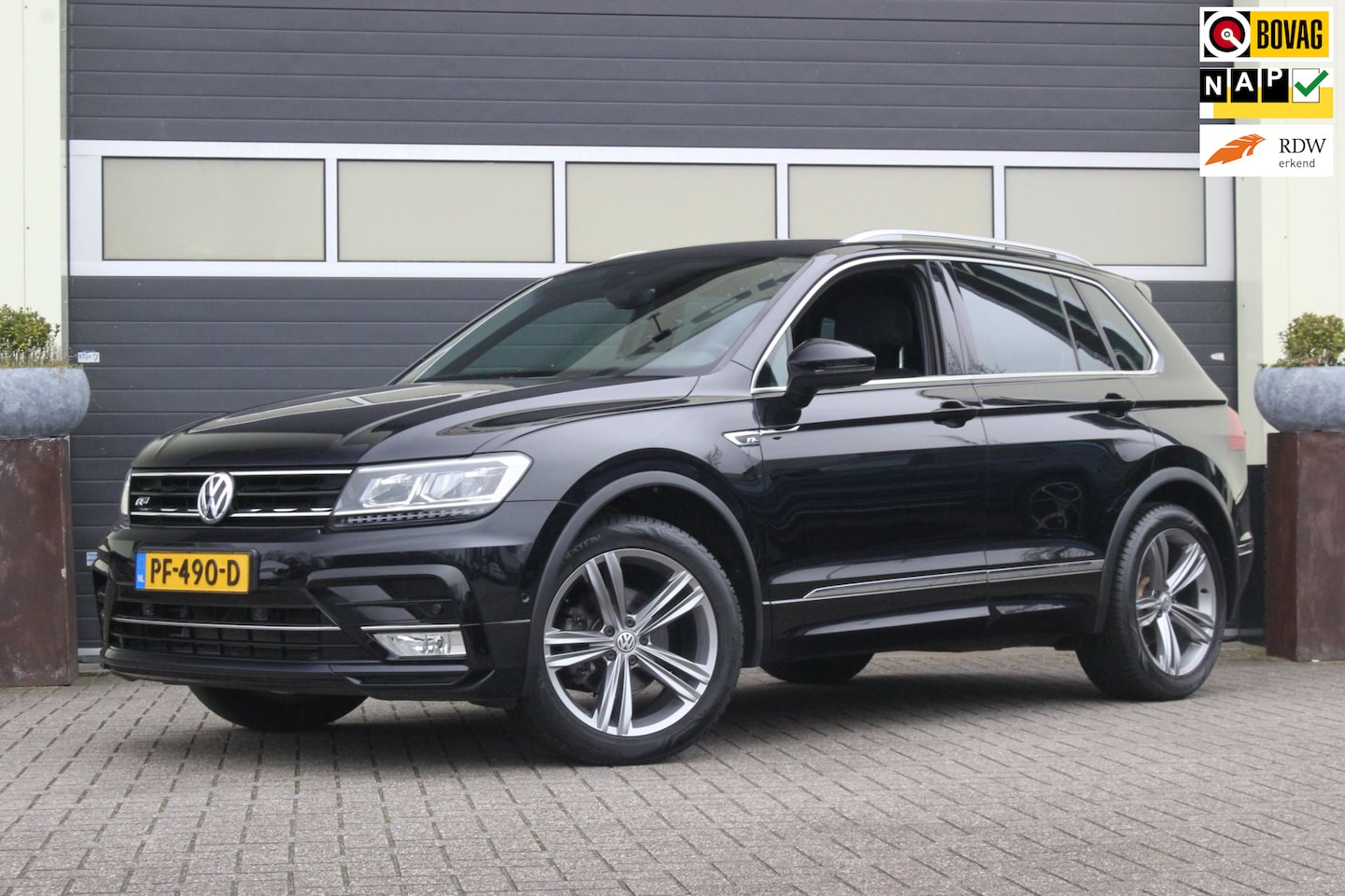 Volkswagen Tiguan - 1.4 TSI ACT R-Line | Trekhaak | 19 Inch | - AutoWereld.nl
