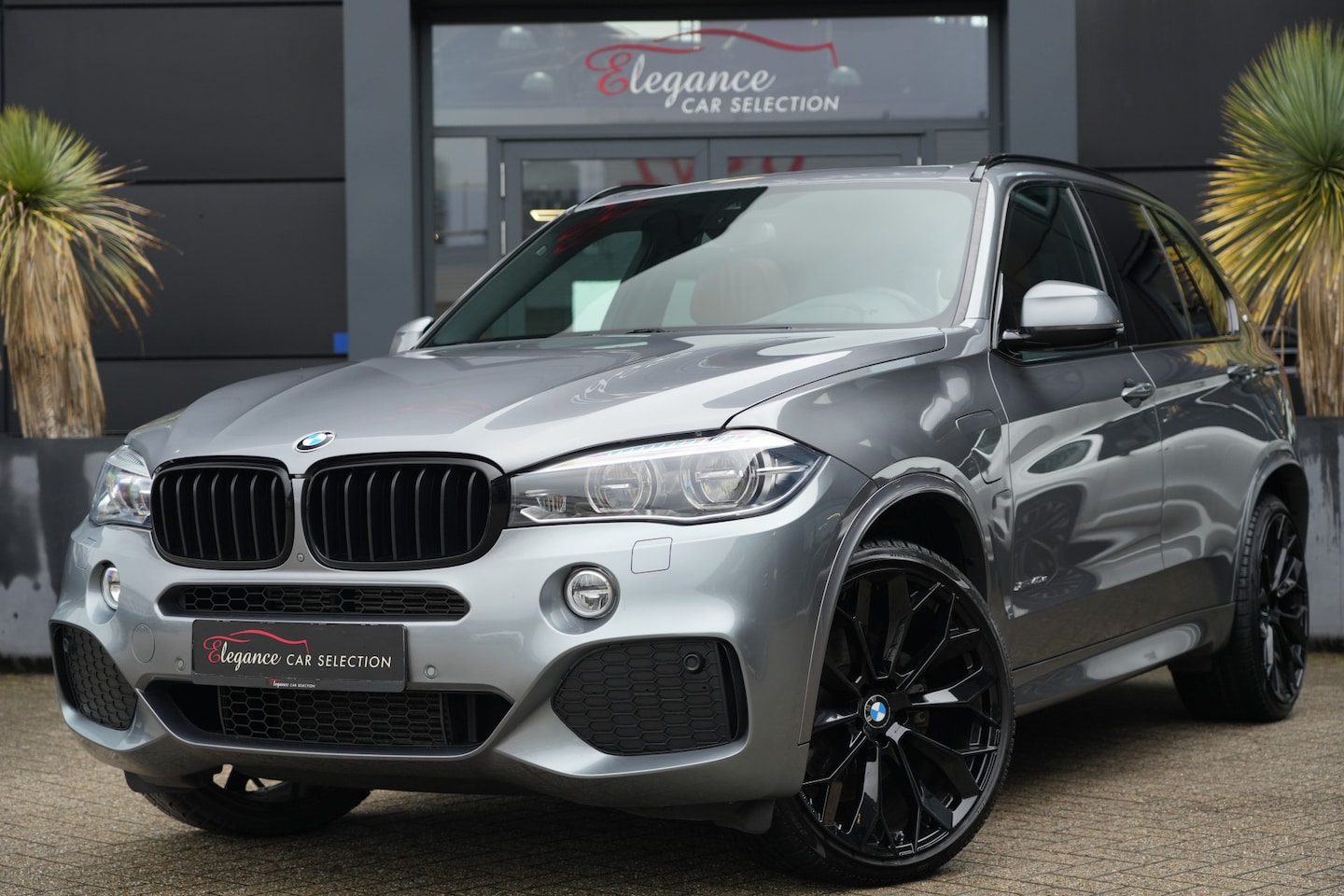 BMW X5 - xDrive40e M Sport High Executive 313pk Panoramadak/Stoelverwarming/360Camera - AutoWereld.nl