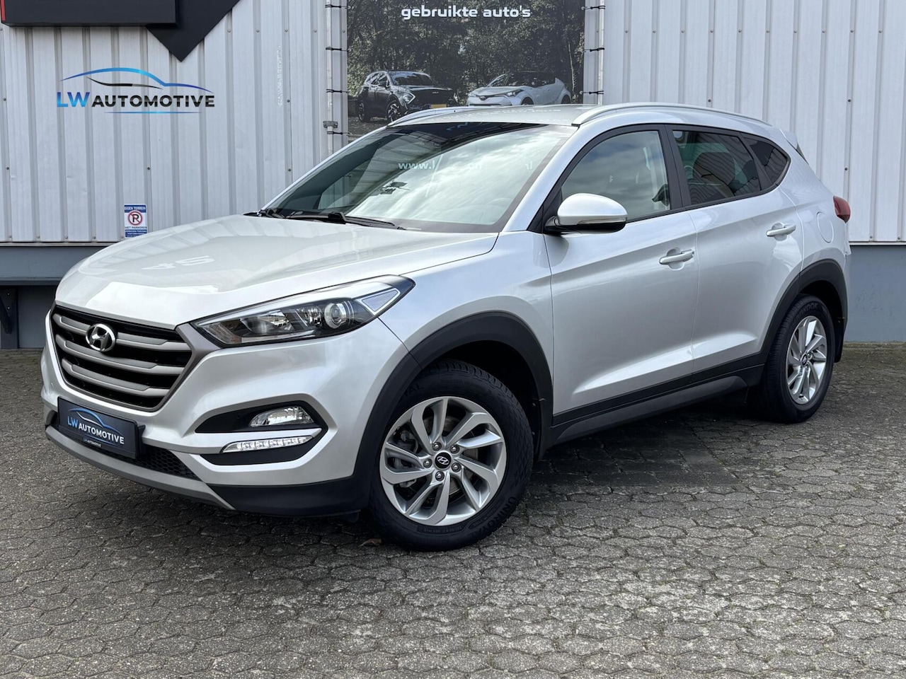 Hyundai Tucson - 1.6 GDi Comfort | Navi | Camera | Trekhaak | Stoel+stuurverw. - AutoWereld.nl