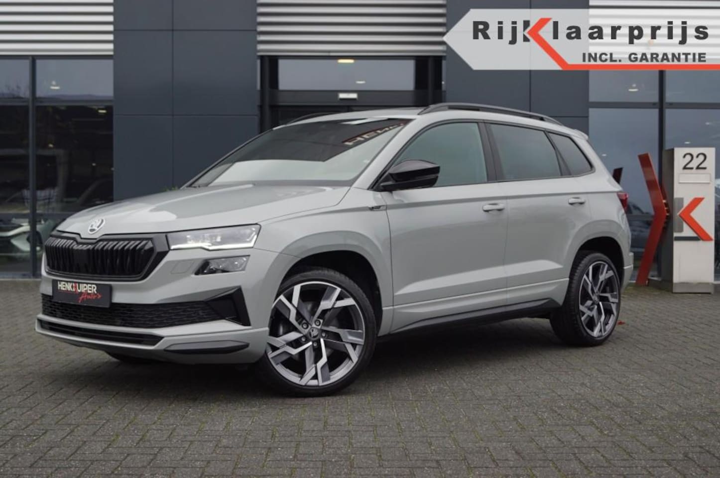 Skoda Karoq - 1.5 TSI DSG Sportline 150pk/Trekhaak wegklb./Panodak/ Navi Columbus/ACC/DCC/Camera - AutoWereld.nl