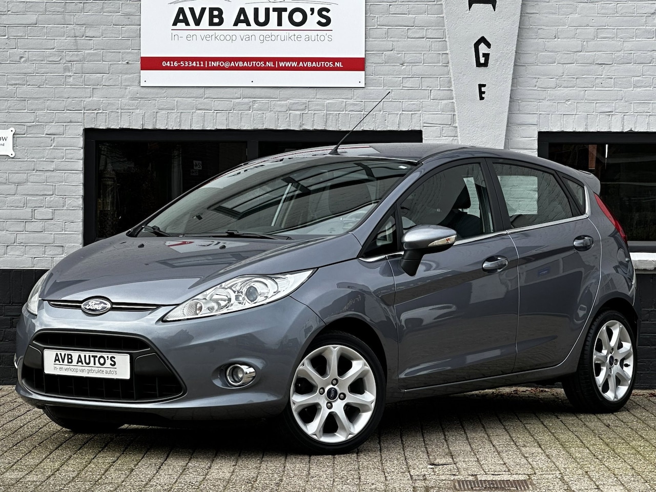 Ford Fiesta - 1.25 Titanium Clima Spoiler Stoelverwarming - AutoWereld.nl