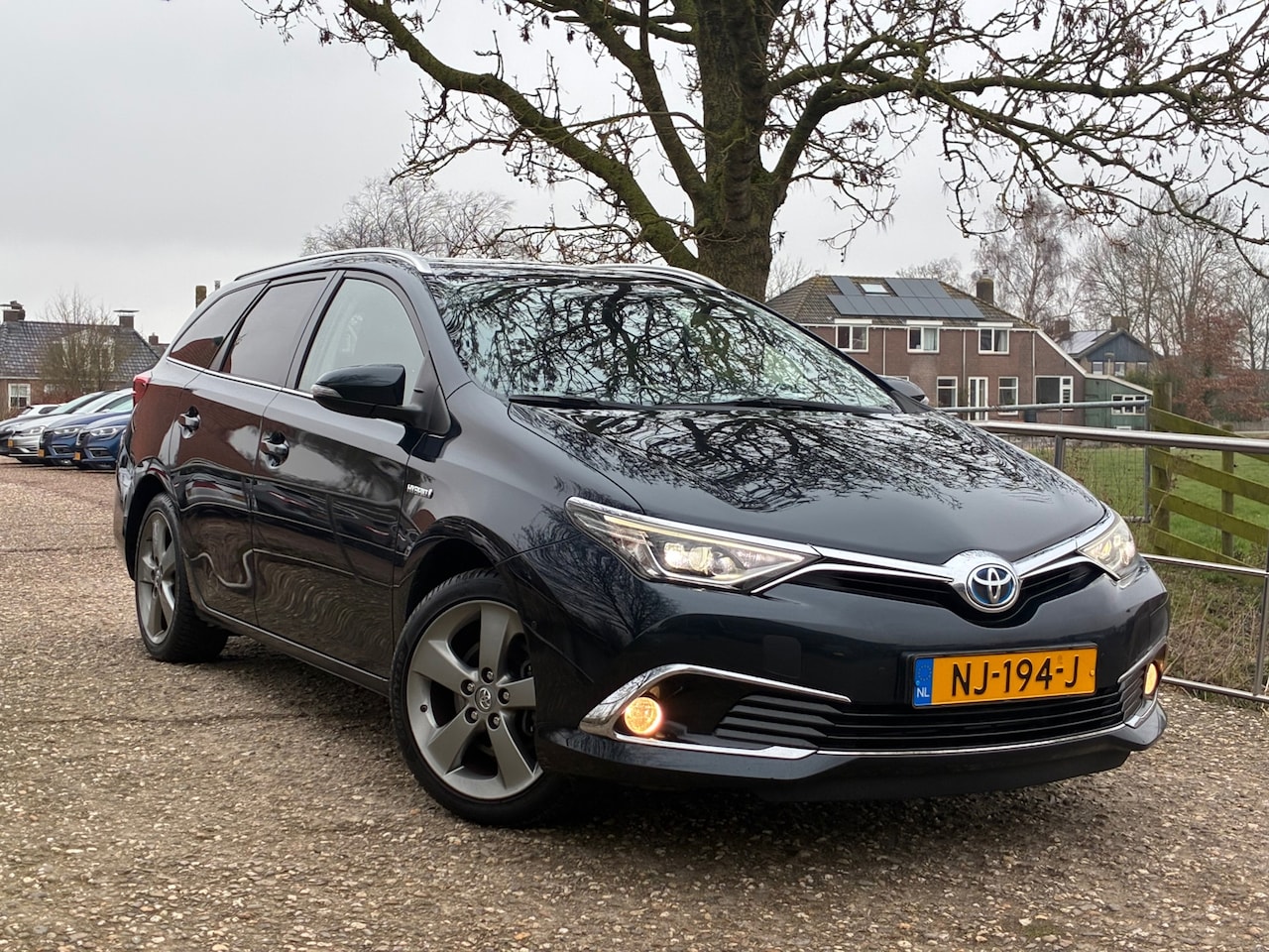Toyota Auris Touring Sports - 1.8 Hybrid Lease pro | Pano + Half leder + Cruise nu € 10.975,-!!! - AutoWereld.nl