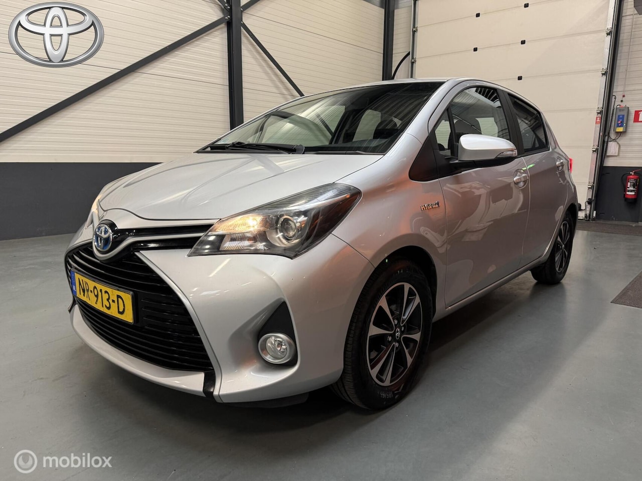 Toyota Yaris - 1.5 Hybrid Aspiration Navi|Cruise|Camera|Trekhaak - AutoWereld.nl