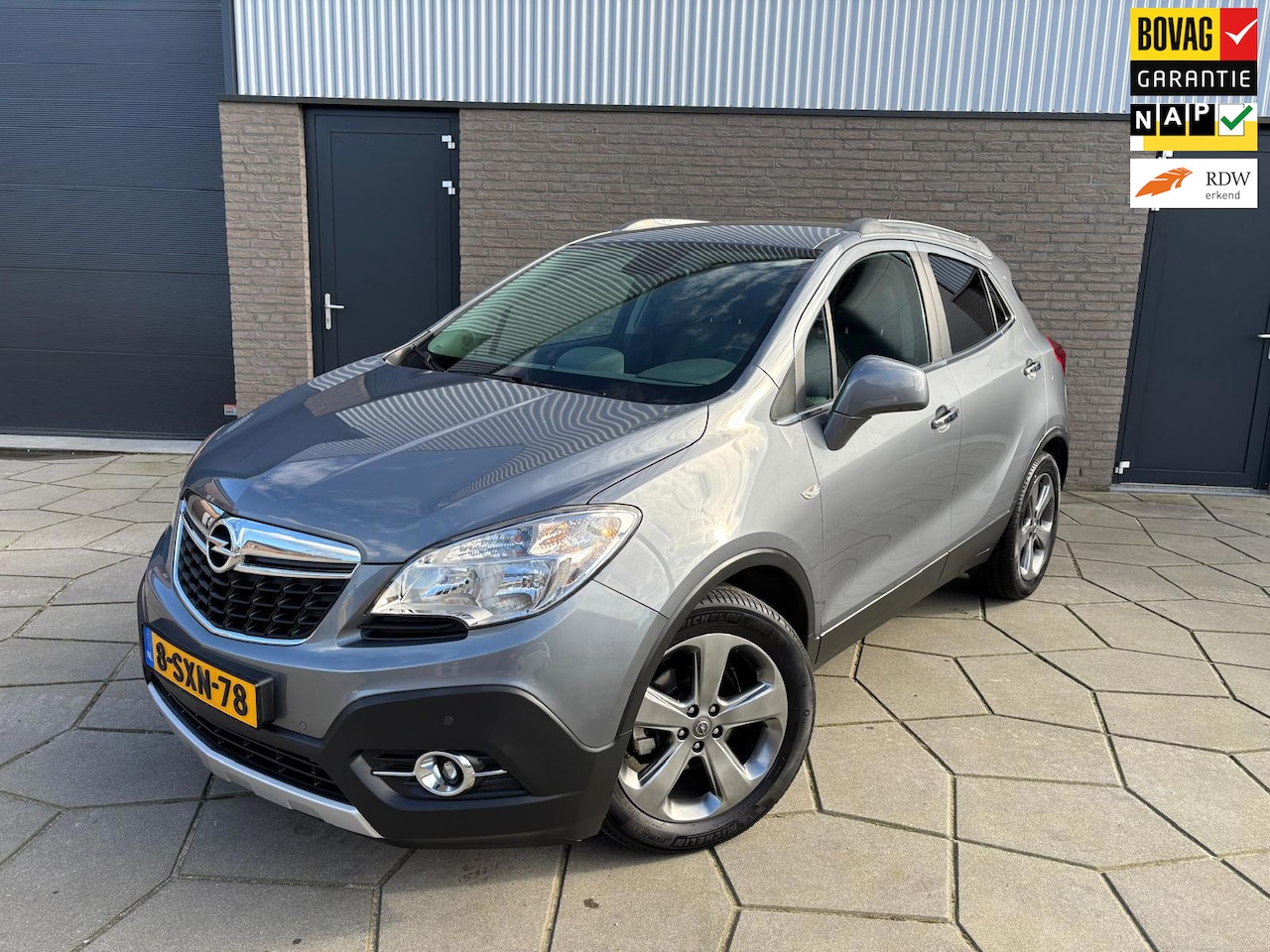 Opel Mokka - 1.6 Cosmo|Trekhaak |Half leder |Cruise-Lim.| 18 Inch. lichtm grote wielen - AutoWereld.nl