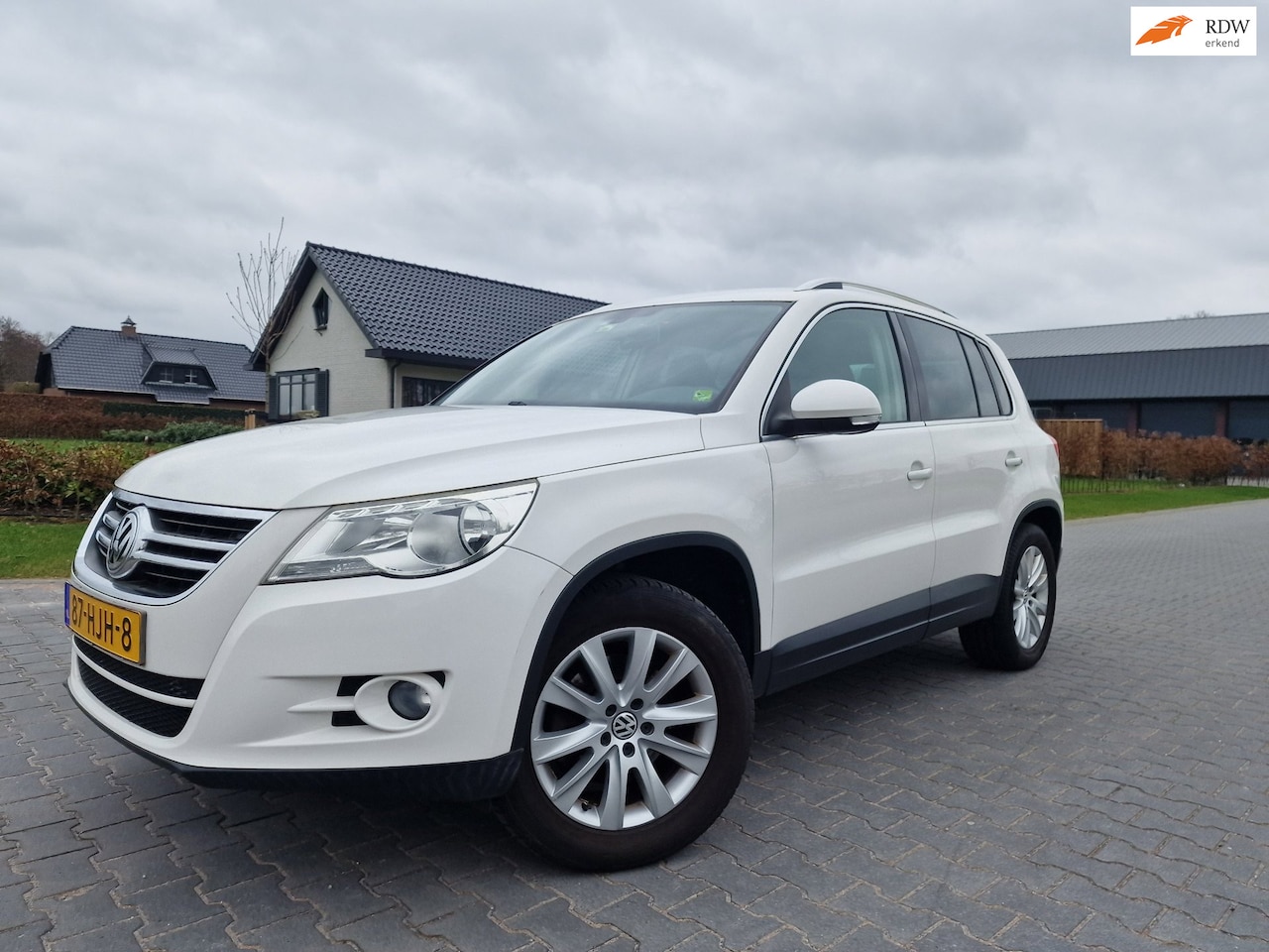 Volkswagen Tiguan - 1.4 TSI Sport&Style CRUISE 2 X SLEUTELS - AutoWereld.nl