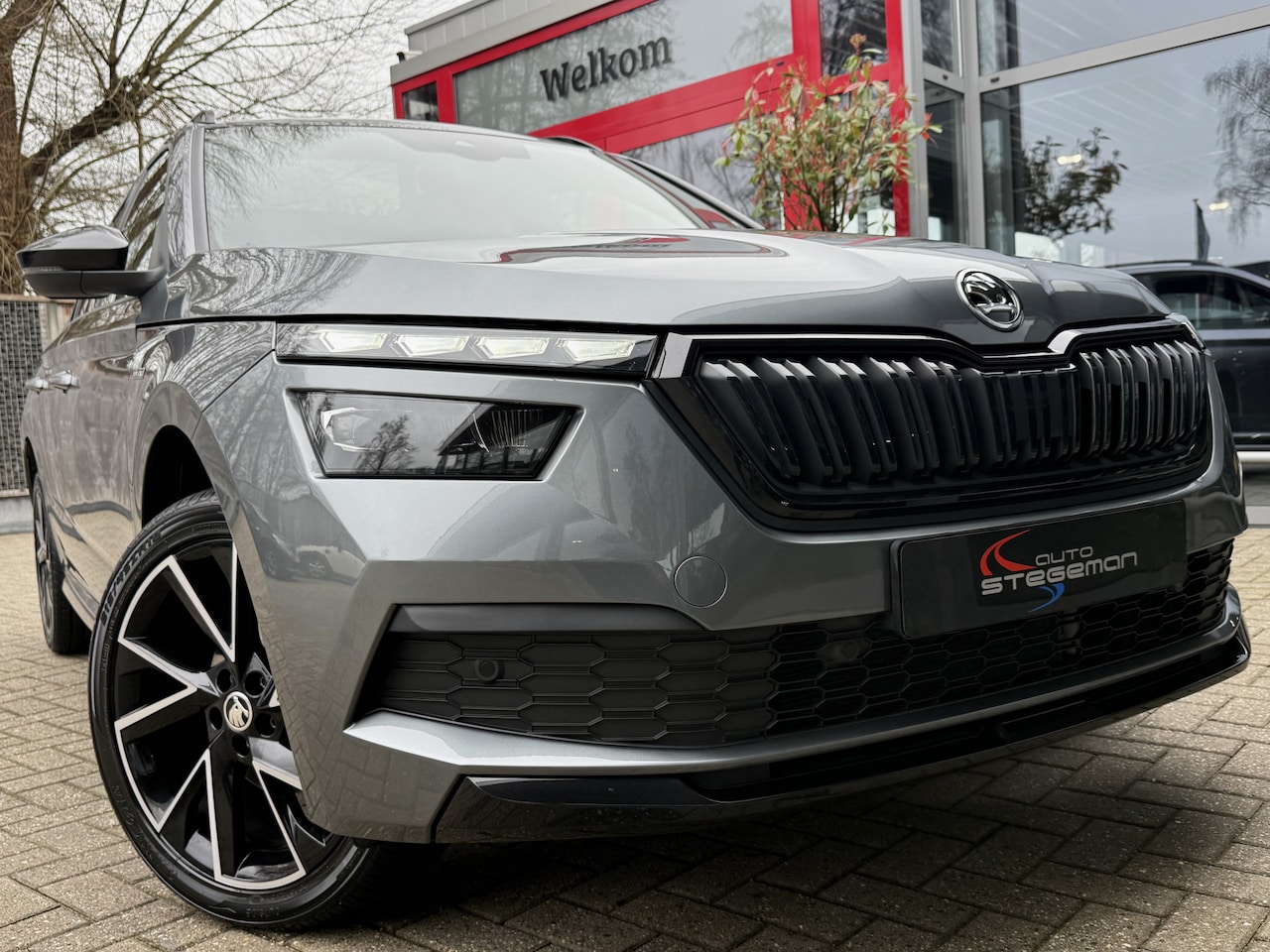 Skoda Kamiq - 1.0 TSI AUT *!* MONTE CARLO *!* PANODAK/ CAMERA/ 18 INCH/ LED *!* - AutoWereld.nl