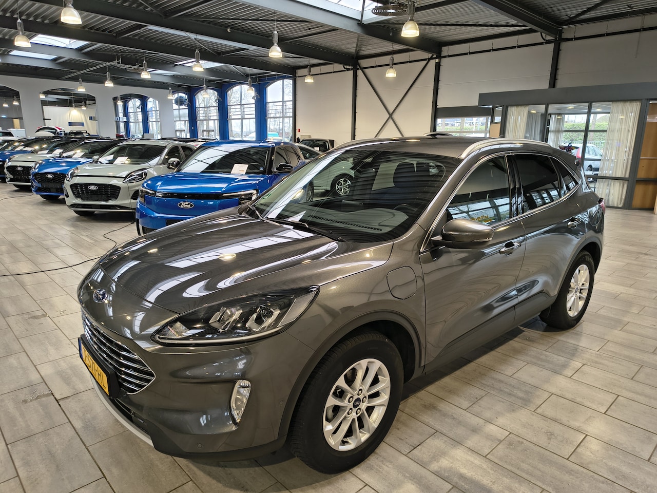 Ford Kuga - 2.5 PHEV 225 pk Titanium | Trekhaak | Camera's | Adapt. cruise | Navi | Clima | Cruise | 4 - AutoWereld.nl