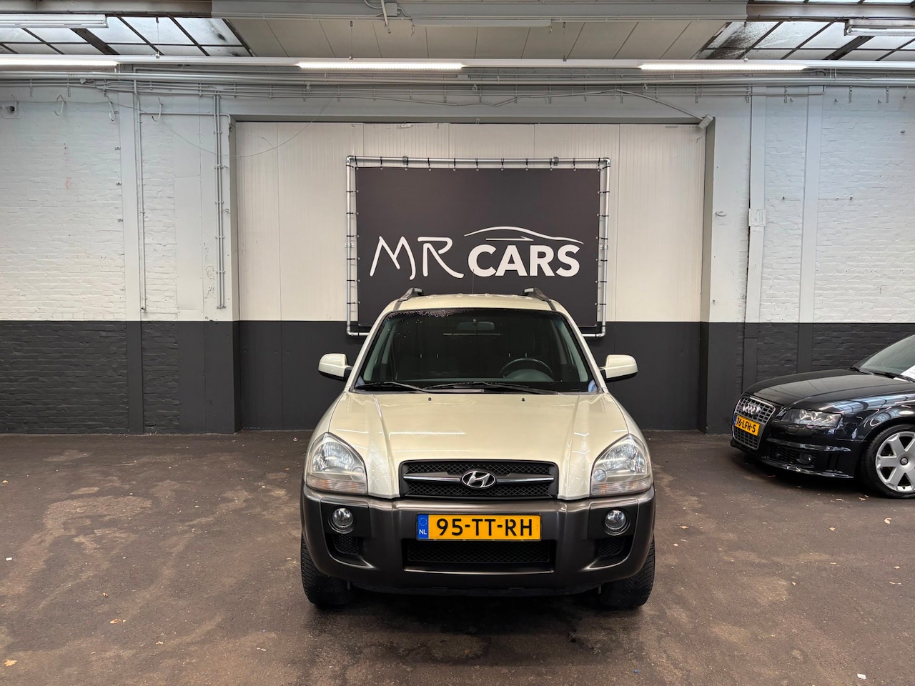 Hyundai Tucson - 2.0i Style Airco/Cruise Control - AutoWereld.nl