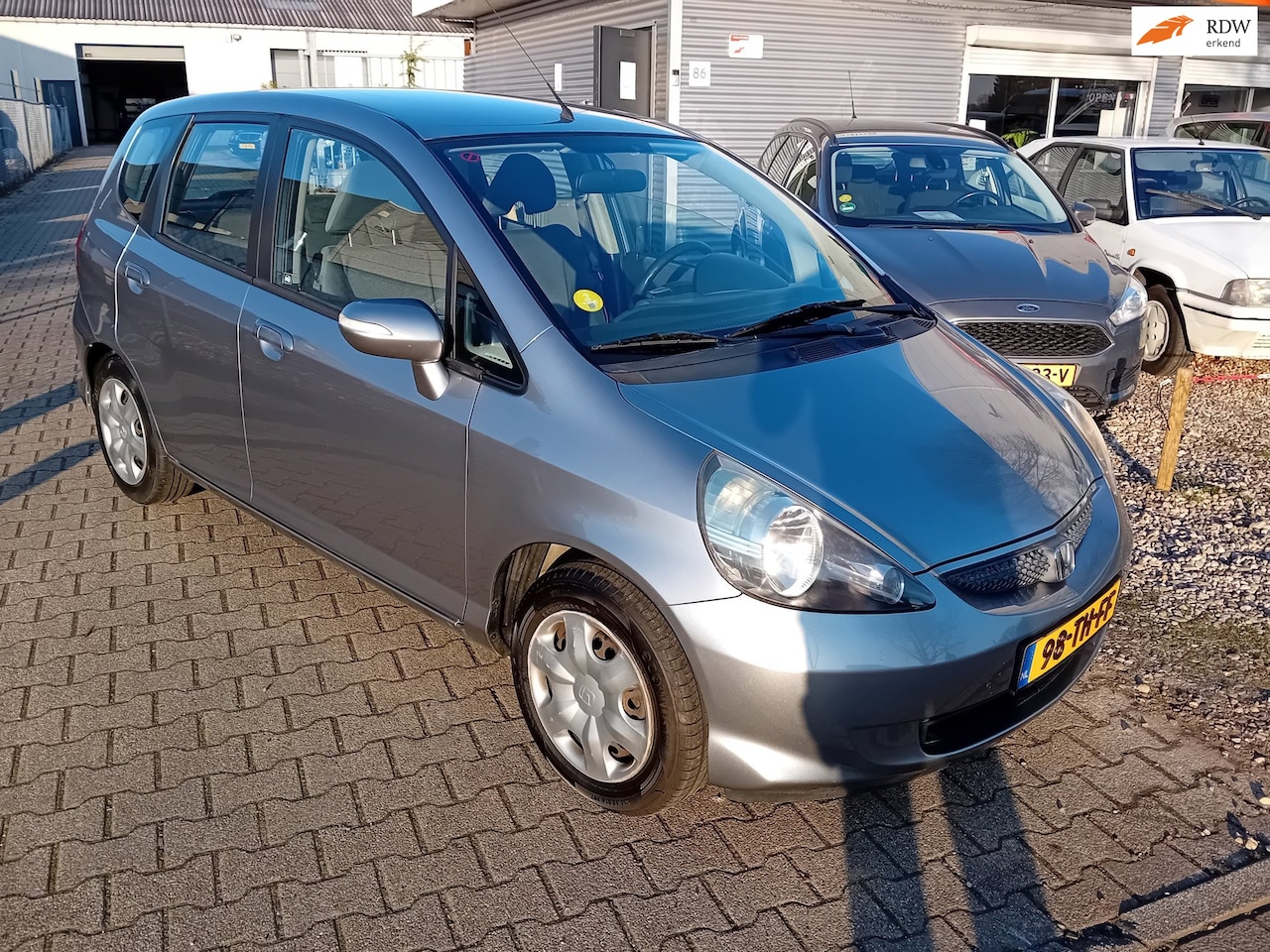 Honda Jazz - 1.4 LS IJSKOUDE AIRCO, NIEUWE APK! SLECHTS 140DKM! - AutoWereld.nl
