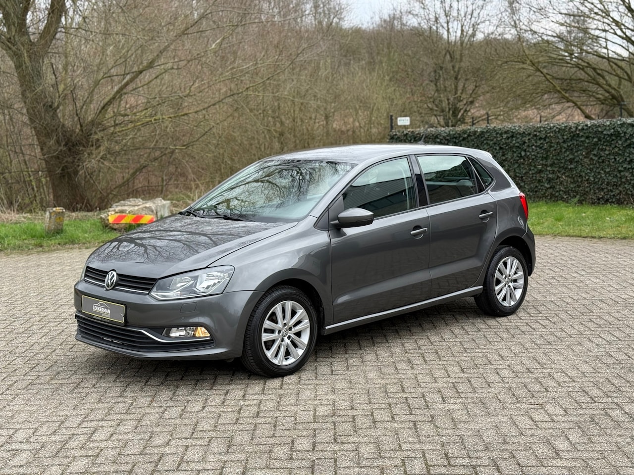 Volkswagen Polo - 1.2 TSI Highline PDC I CLIMA I CRUISE I WEINIG KM I LEUKE AUTO - AutoWereld.nl