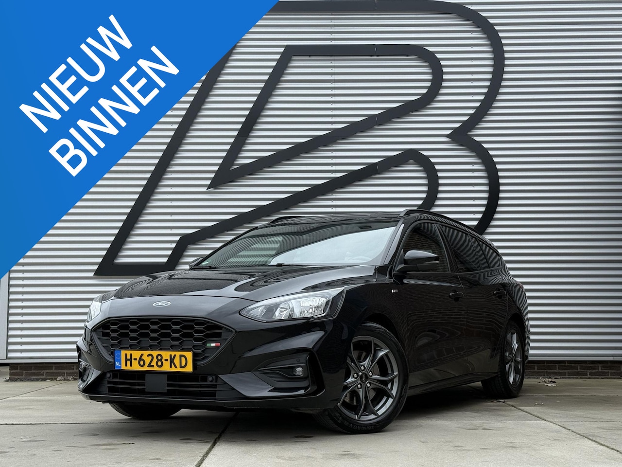 Ford Focus Wagon - 1.0 EcoBoost ST Line Business Navi|Trekhaak|Clima|PDC V+A|Cruise|Stoelverwarming|APK tot 0 - AutoWereld.nl