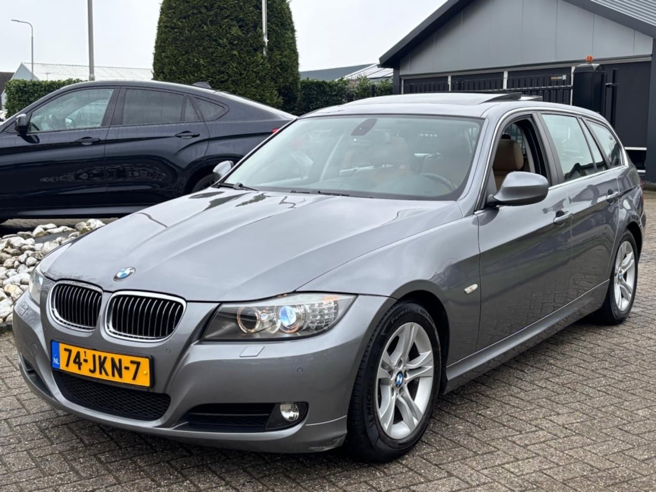 BMW 3-serie Touring - 320i High Exe Sport 2009 Panodak Leer Xenon - AutoWereld.nl