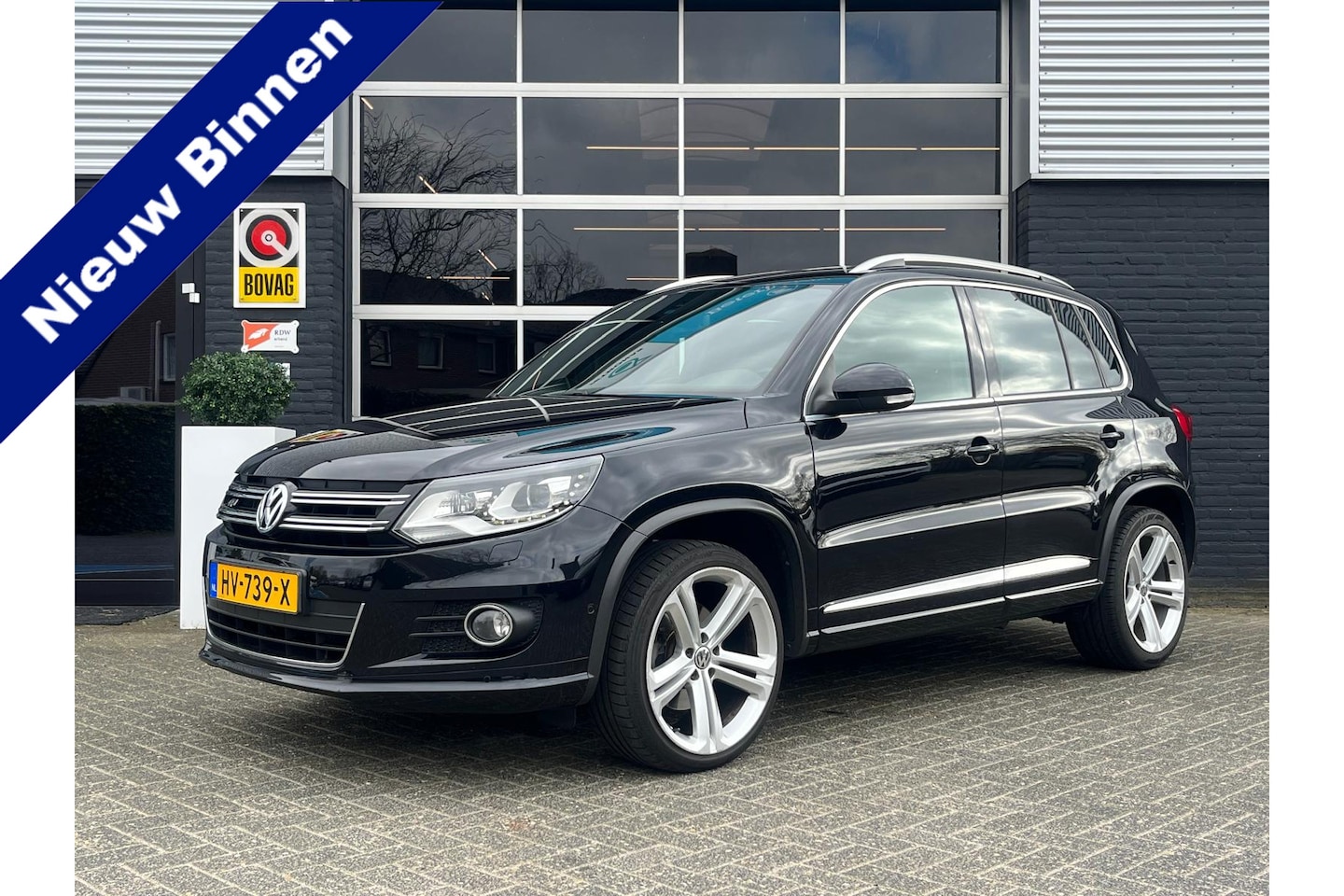 Volkswagen Tiguan - 1.4 TSI 3X R-Line, Automaat, Pano, Bluetooth, Cruise, Navi, Trekhaak, NAP - AutoWereld.nl