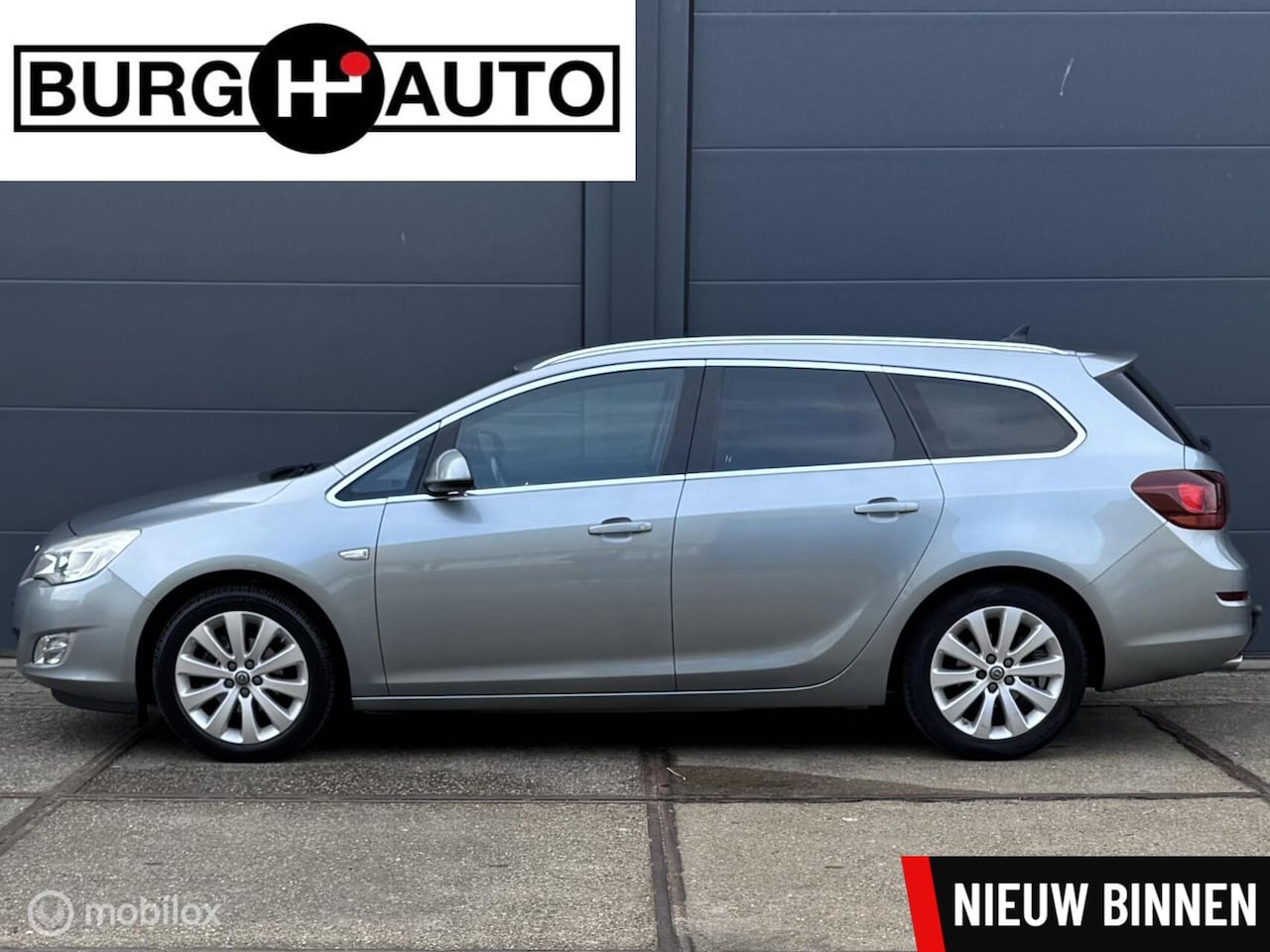 Opel Astra Sports Tourer - 1.4 Turbo Cosmo - AGR STOELEN - ECC - NAVI - PDC - TREKHAAK - STOEL + STUUR VERWARMING - C - AutoWereld.nl