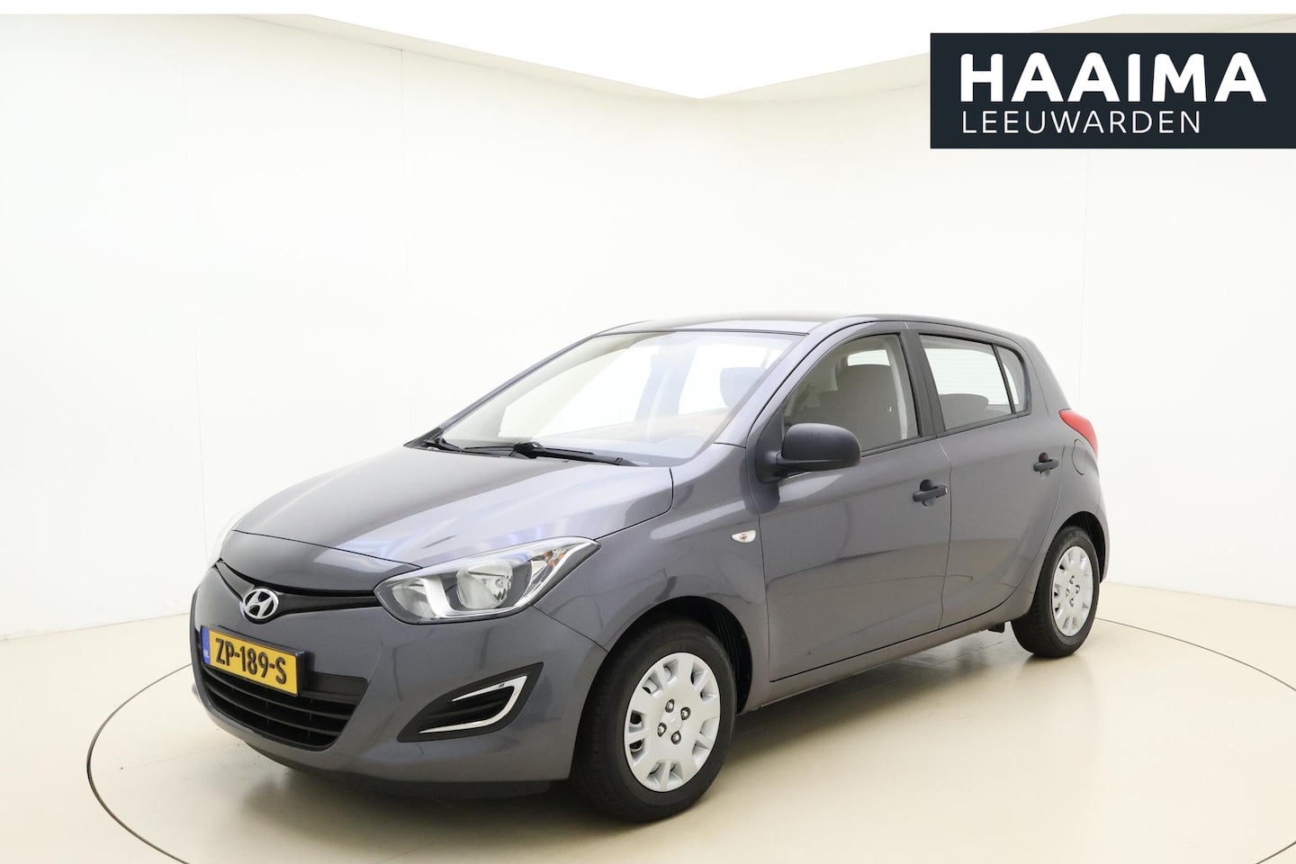 Hyundai i20 - 1.2 16v 85pk 5drs HP i-Motion | Airco | Centrale deurvergrendeling | Metallic lak | Radio/ - AutoWereld.nl