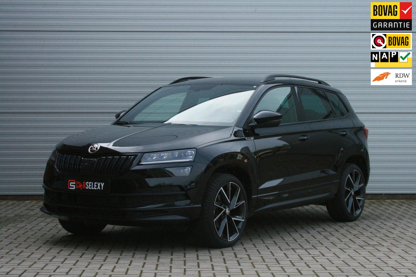 Skoda Karoq - 1.5 TSI ACT Sportline Business/DSG/LED - AutoWereld.nl