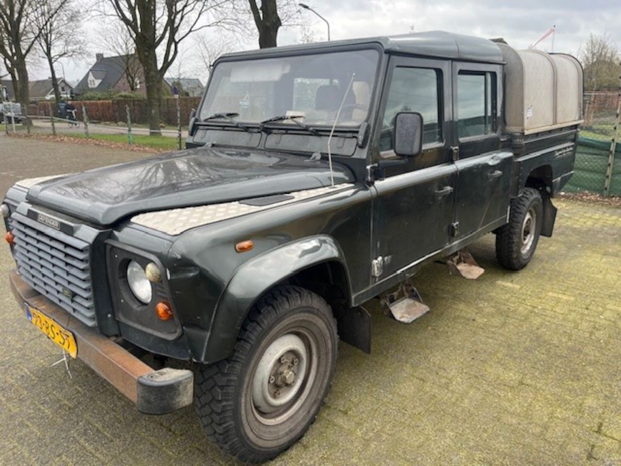 Land Rover Defender 130 - 2.5 Td5 130" Crew Cab 5 PERS VAN UNIEKE BETAALBARE OPKNAPPER € 10.400 EXCL Altijd al deze - AutoWereld.nl