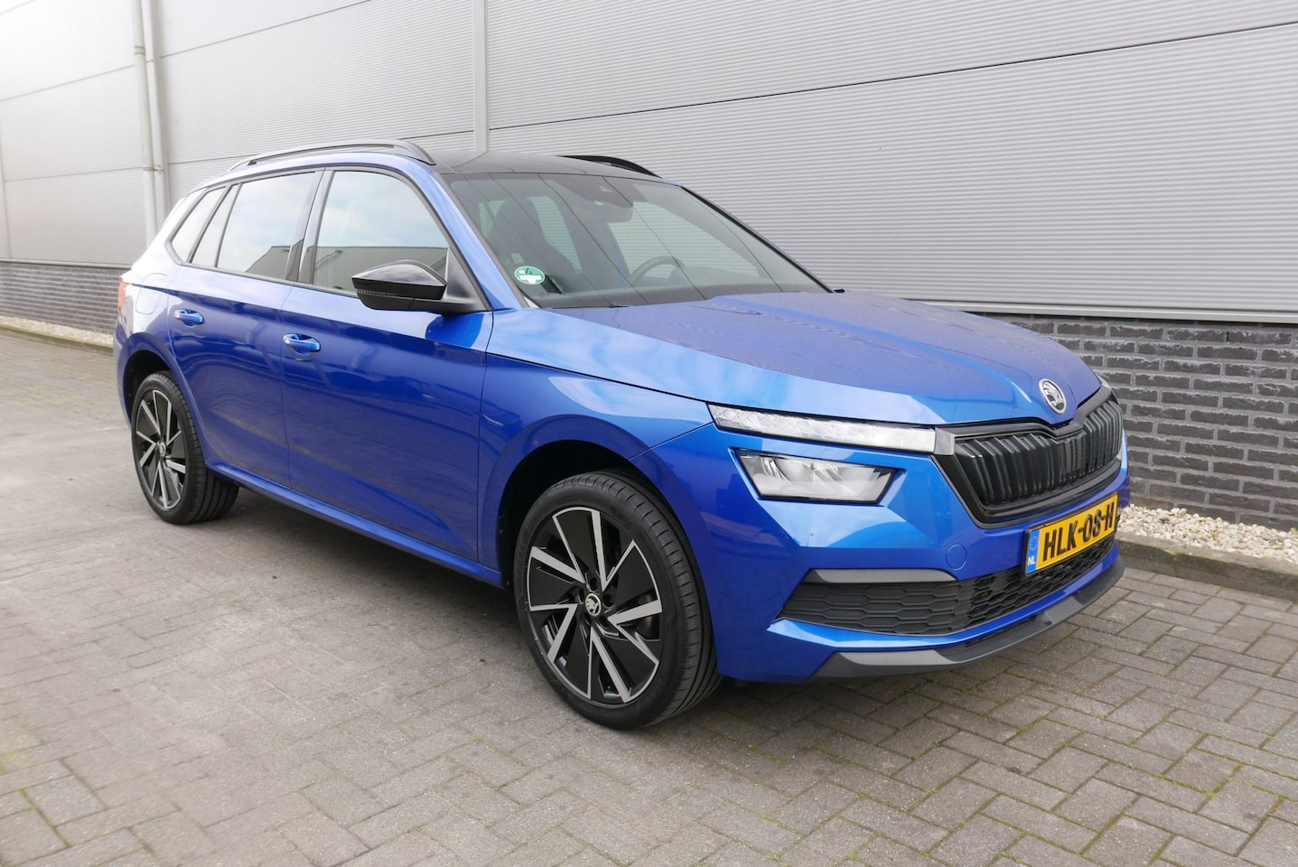 Skoda Kamiq - 1.0 TSI Sport Business AUT,CLIMA,PANORAMADAK. - AutoWereld.nl