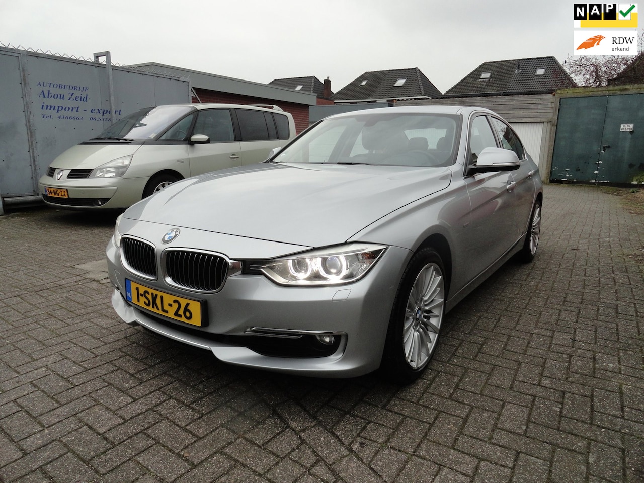 BMW 3-serie - 320i AUT Executive (KM 153107 NAP) NIEUWSTAAT - AutoWereld.nl