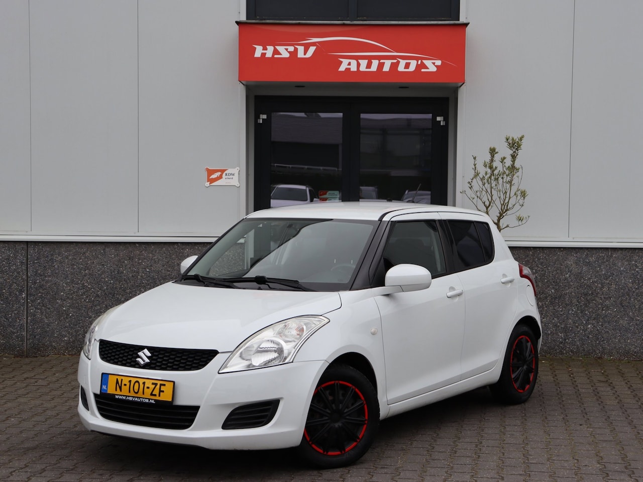 Suzuki Swift - 1.2 Summer EASSS airco 4-DEURS cruise - AutoWereld.nl