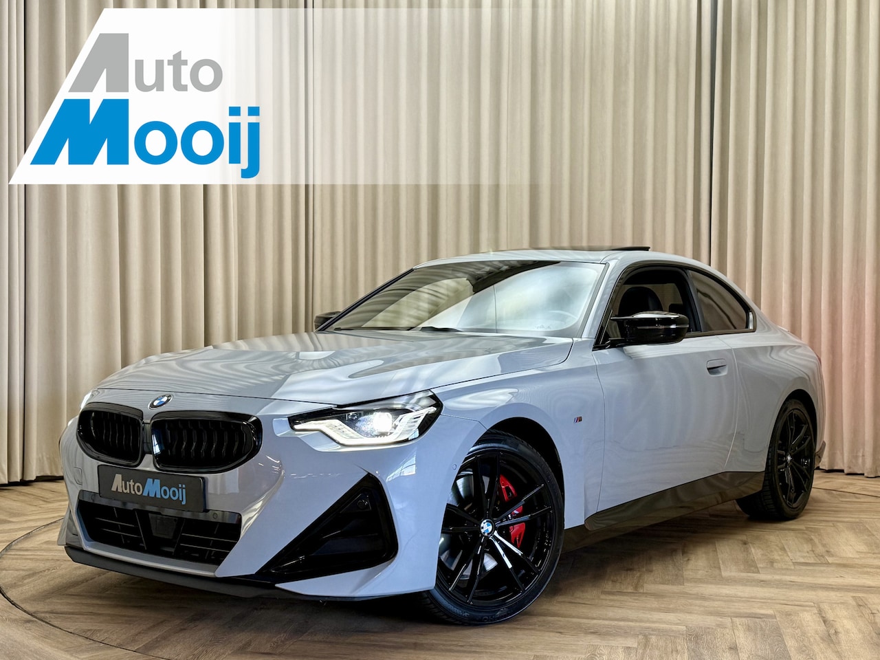 BMW 2-serie Coupé - M240i xDrive *Brooklyn Grey* Schuif-/Kanteldak HUD / Harman/Kardon / Stuurverwarming / Key - AutoWereld.nl