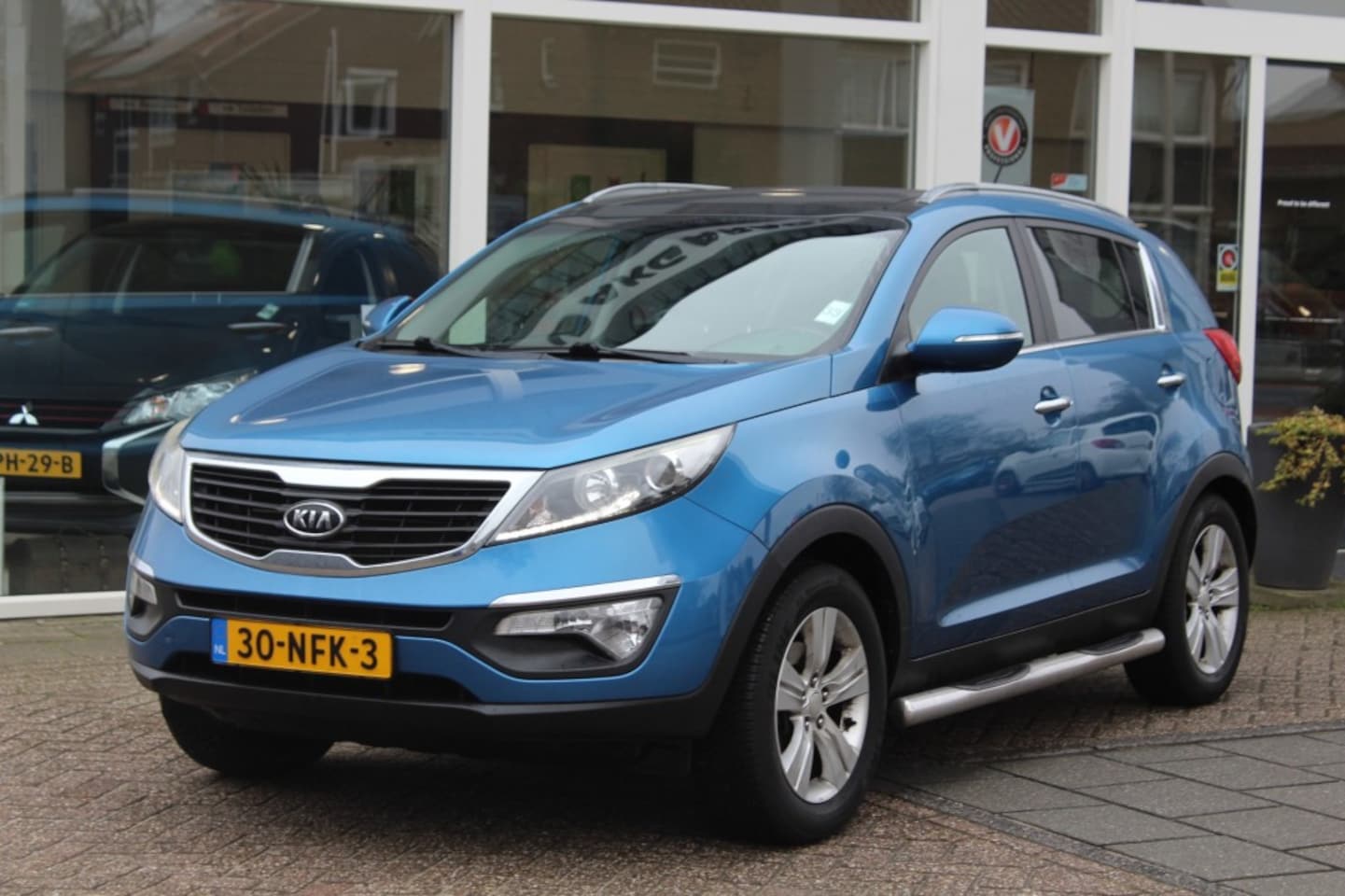 Kia Sportage - 2.0 X-clusive 2.0 X-CLUSIVE - AutoWereld.nl