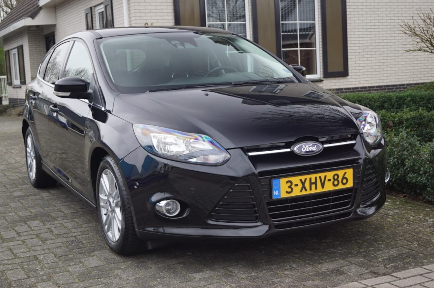 Ford Focus - 1.0 Ecoboost (125pk) Titanium 1ste Eigenaar! Dealer Onderhouden! Navi/Stoelverwarming/Trek - AutoWereld.nl
