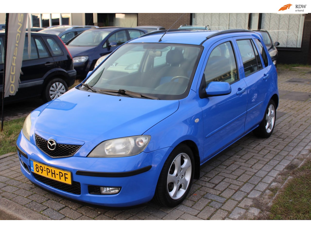 Mazda 2 - 1.6 Sportive Airco Uniek! LM-velgen Elec pakket Dakspoiler NAP APK - AutoWereld.nl