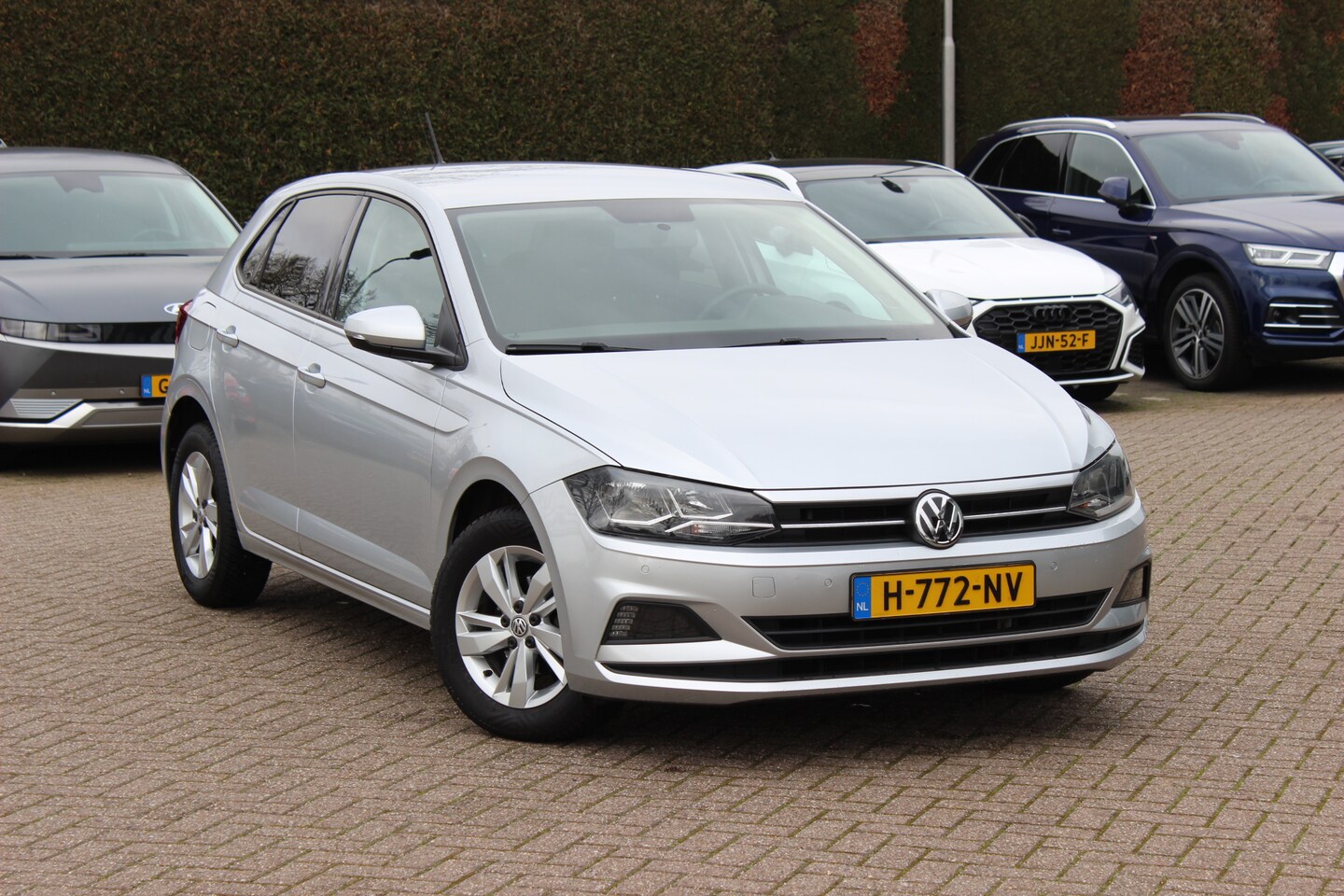 Volkswagen Polo - 1.0 TSI AUTOMAAT / Navigatie / Parkeerhulp V+A / 15'' / Stoelverwarming / CarPlay / Cruise - AutoWereld.nl