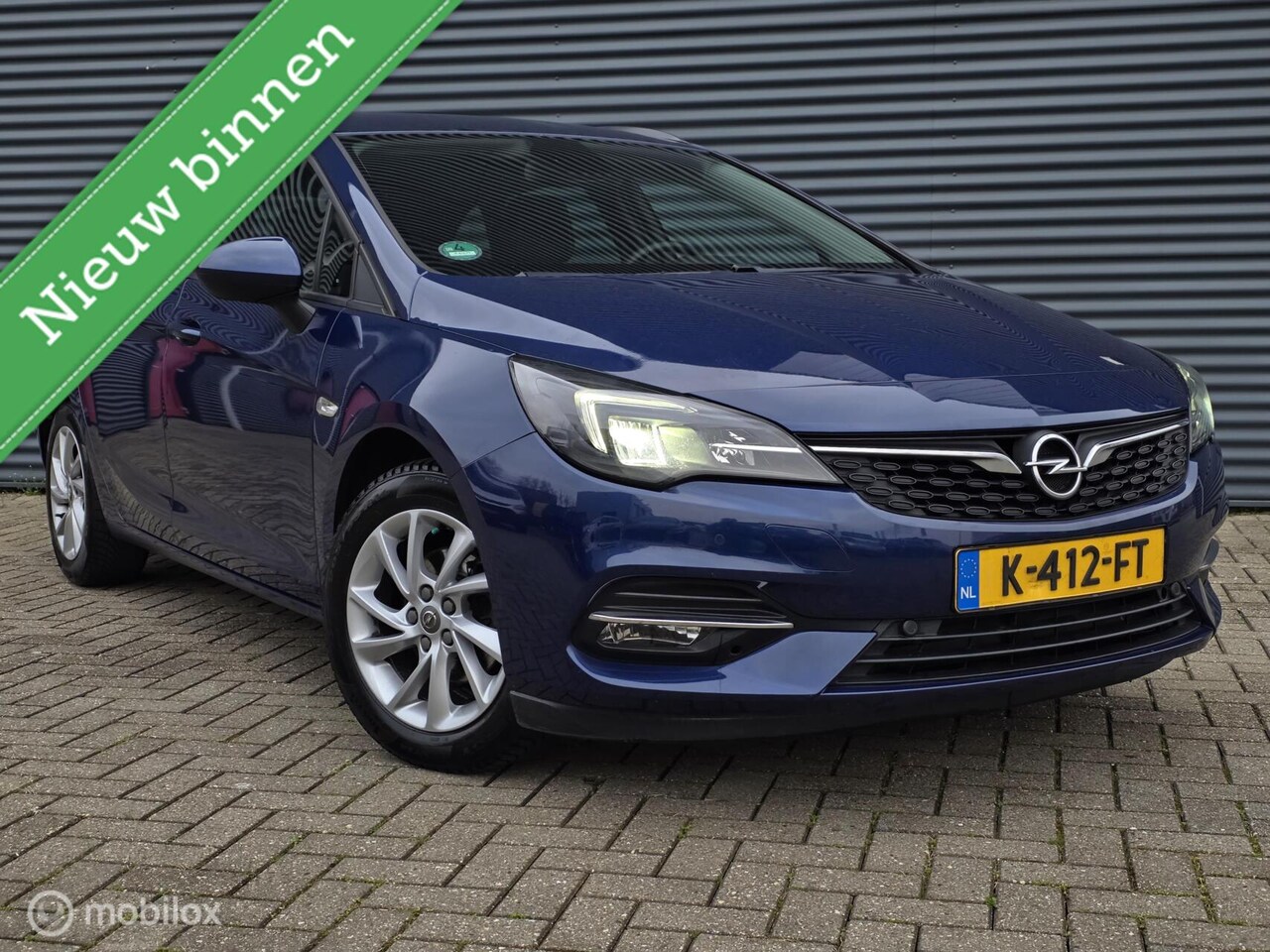 Opel Astra Sports Tourer - 1.2 Blitz Elegance 1.2 Blitz Elegance - AutoWereld.nl