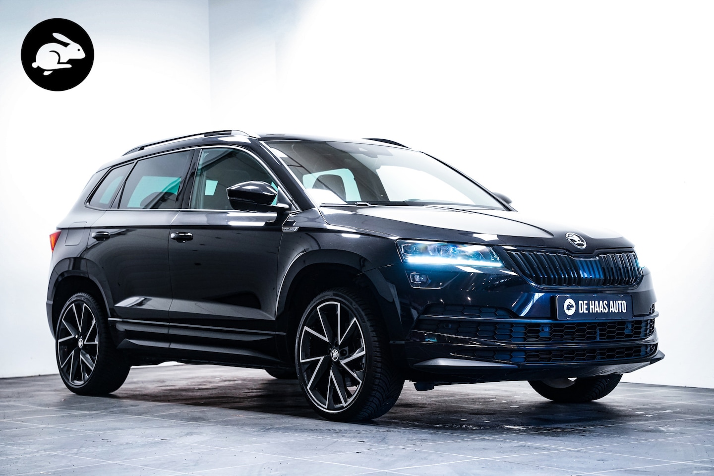 Skoda Karoq - 1.5 TSI Sportline|Pano dak|19 inch|Trekhaak|Camera - AutoWereld.nl