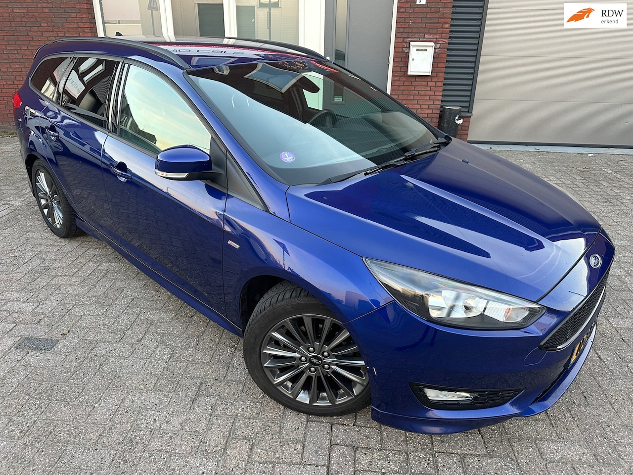 Ford Focus Wagon - 1.0 ST-Line / Navi / PDC / Clima - AutoWereld.nl