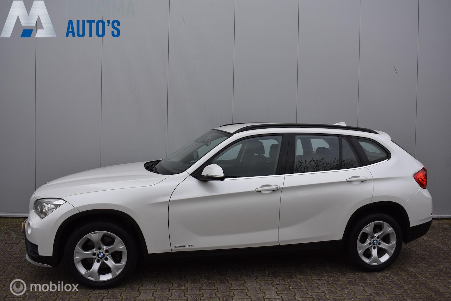 BMW X1 - sDrive20i Mineralweiß 1e Eigenaar! Xenon Trekhaak Clima Cruise Navi 17" LMV APK 03-2027 - AutoWereld.nl