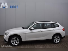 BMW X1 - sDrive20i Mineralweiß 1e Eigenaar Xenon Trekhaak Clima Cruise Navi 17" LMV APK 03-2027