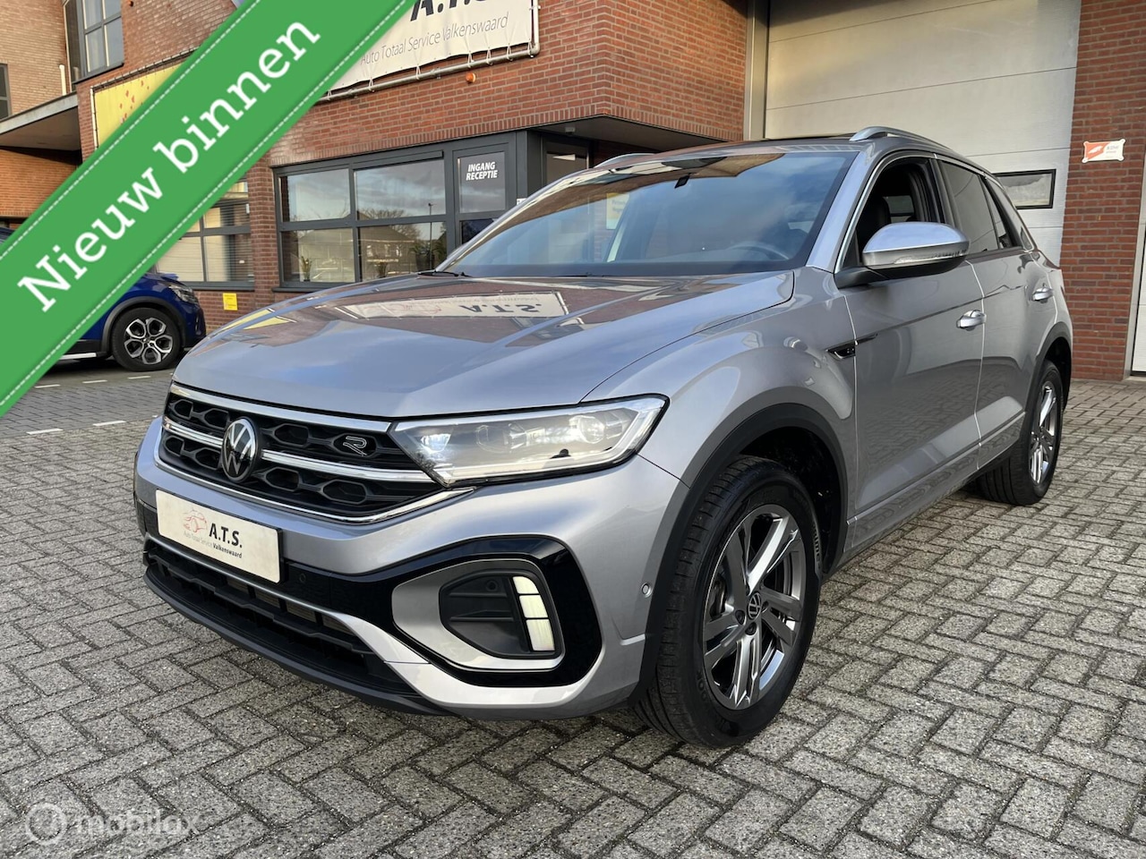 Volkswagen T-Roc - 1.5 TSI R-Line LED*CAMERA*ACC*TREKHAAK*PDC* - AutoWereld.nl