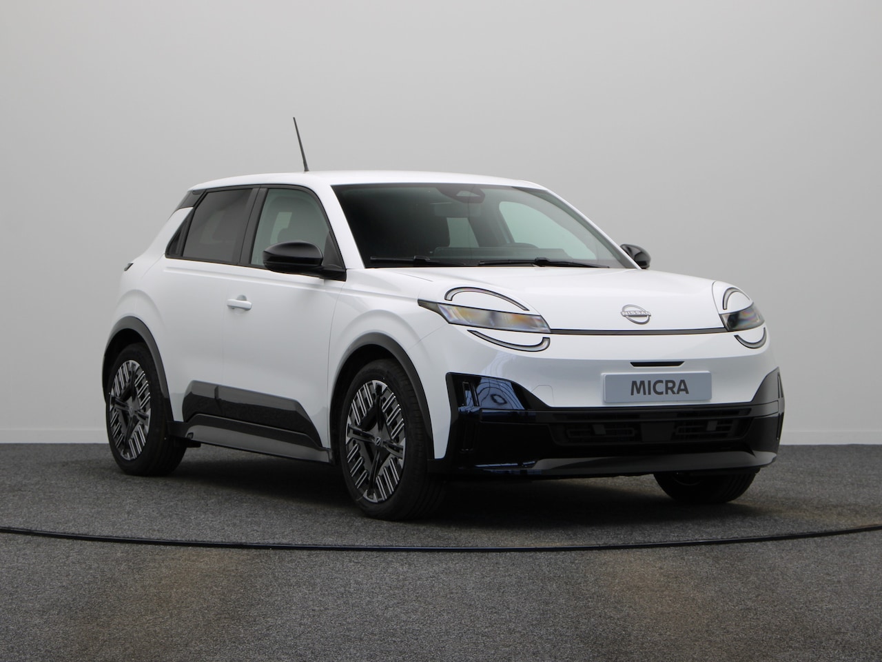 Nissan Micra - Engage 40 kWh | Parkeersensoren achterzijde - AutoWereld.nl