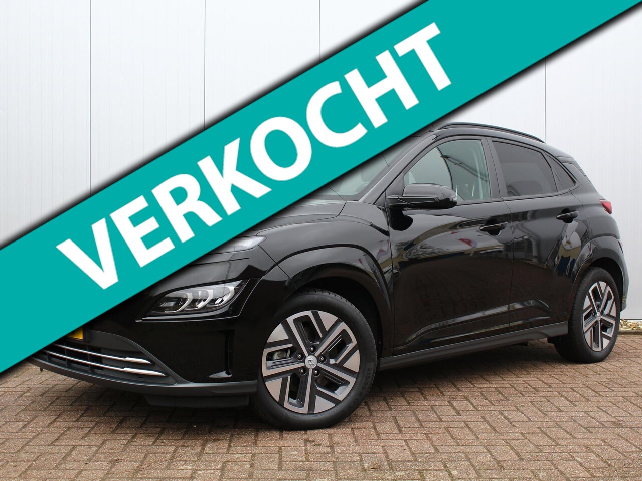 Hyundai Kona Electric - EV Comfort 64 kWh SOH 100% | Warmtepomp | Trekhaak | Stoelverwarming | Achteruitrijcamera - AutoWereld.nl