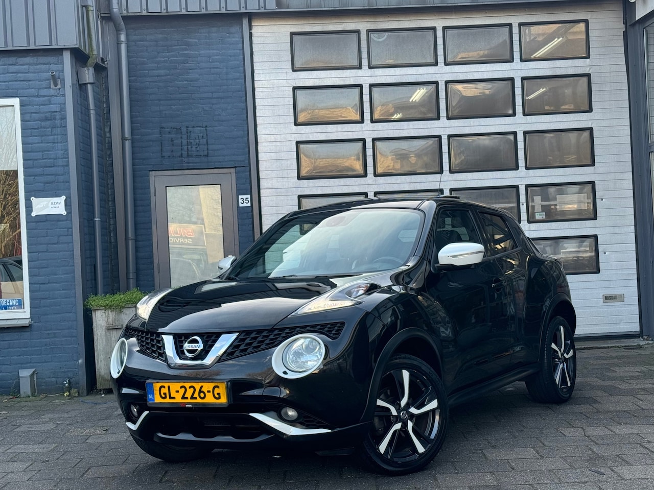 Nissan Juke - 1.2 DIG-T S/S Tekna | Clima | Pano | Leer | Camera - AutoWereld.nl
