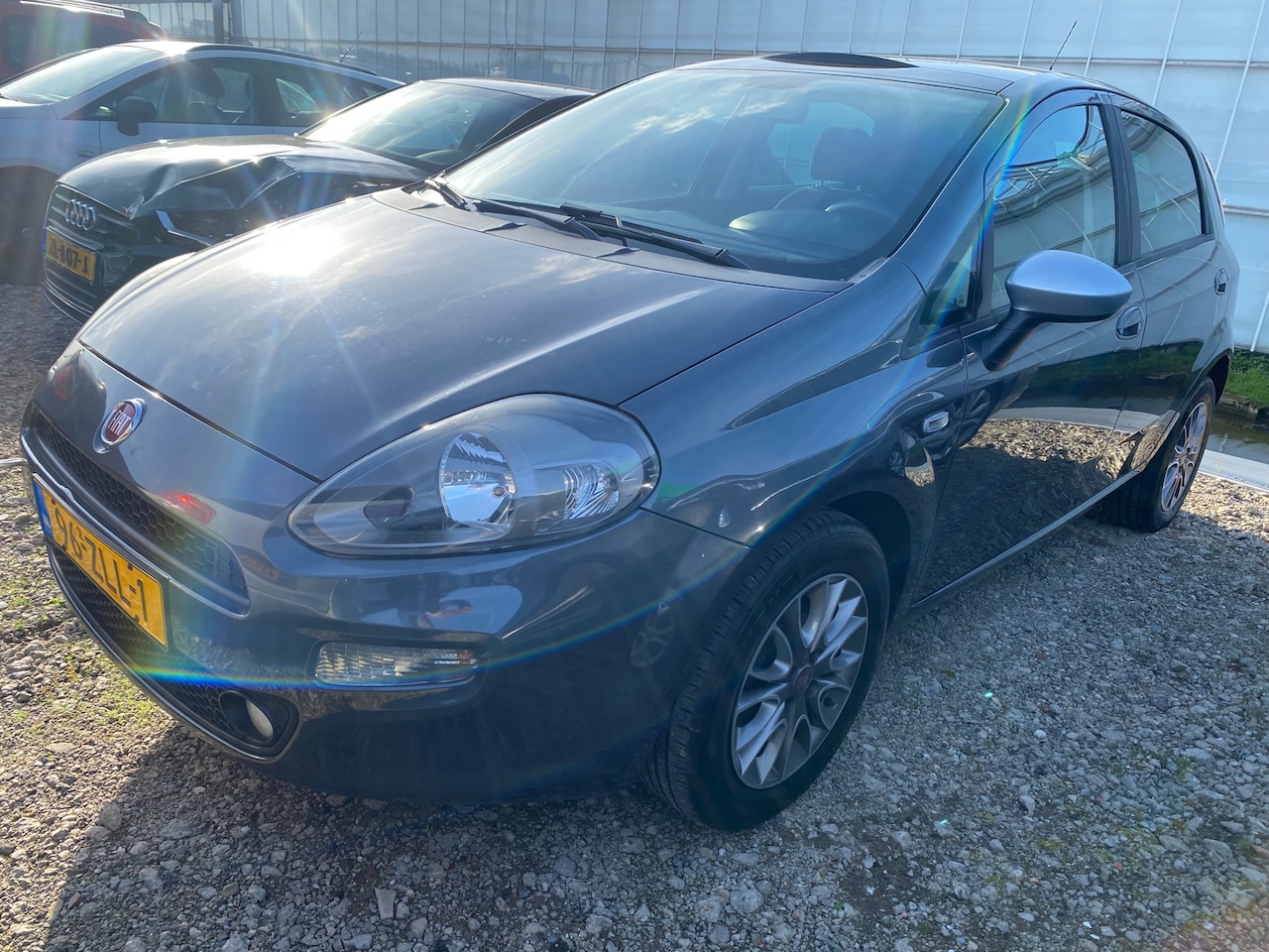 Fiat Punto Evo - 2012 * 0.9 TwinAir Lounge * SCHAKEL BAK PROBLEEM * EXPORT/HANDEL - AutoWereld.nl