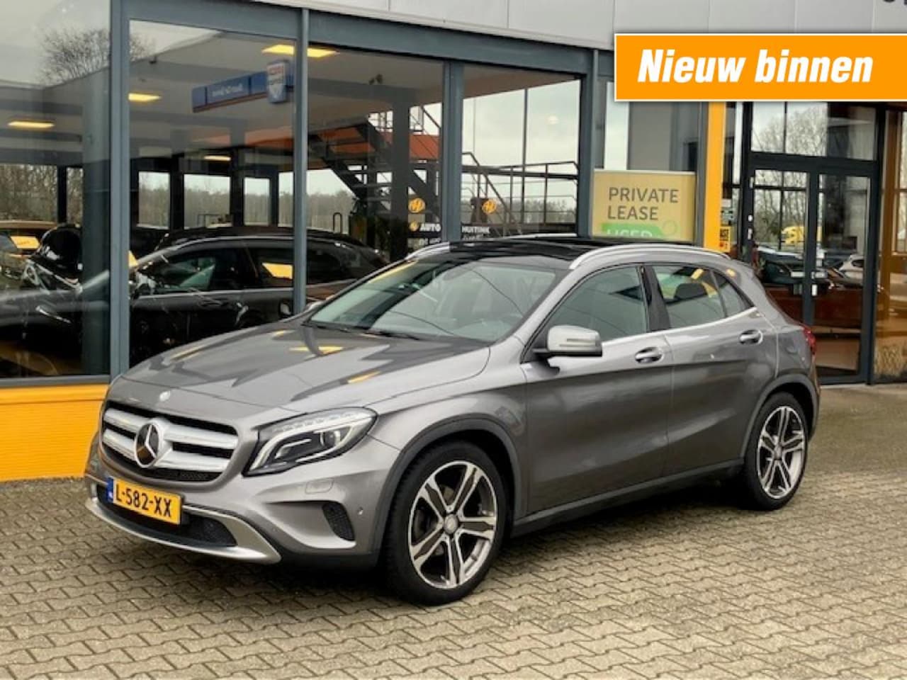 Mercedes-Benz GLA-Klasse - 180 Prestige - Navi - camera - Pan dak - stoelverwarming - AutoWereld.nl