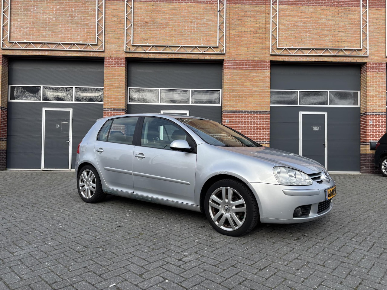 Volkswagen Golf - 1.6 FSI Sportline 1.6 FSI Sportline - AutoWereld.nl