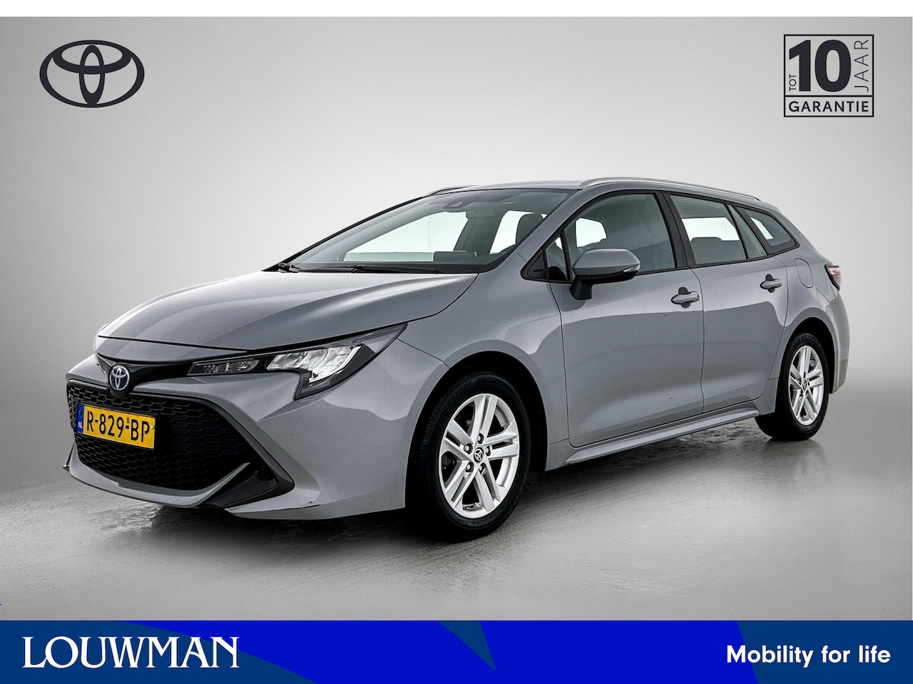Toyota Corolla Touring Sports - 1.8 Hybrid Active | Trekhaak - AutoWereld.nl