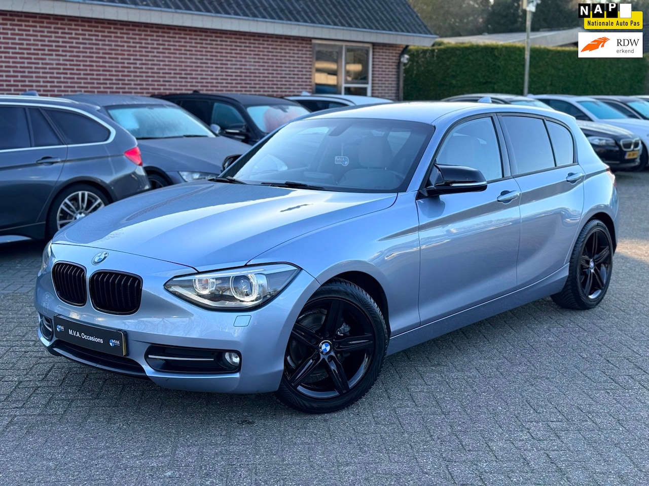BMW 1-serie - 116i High Executive Sport|Nieuwe Ketting + Klepseals|Leder|17 inch|Cruise control|Climate - AutoWereld.nl
