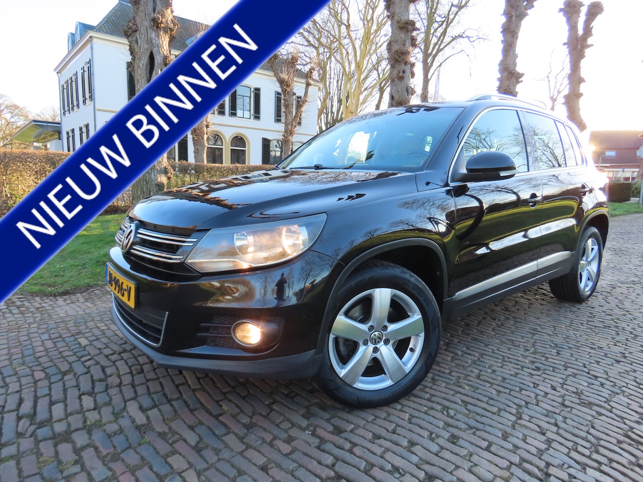 Volkswagen Tiguan - 2.0 TSI Sport&Style 4motion R-line Edition Automaat/DSG 200 PK!! Leer Stoelverwarming Appl - AutoWereld.nl