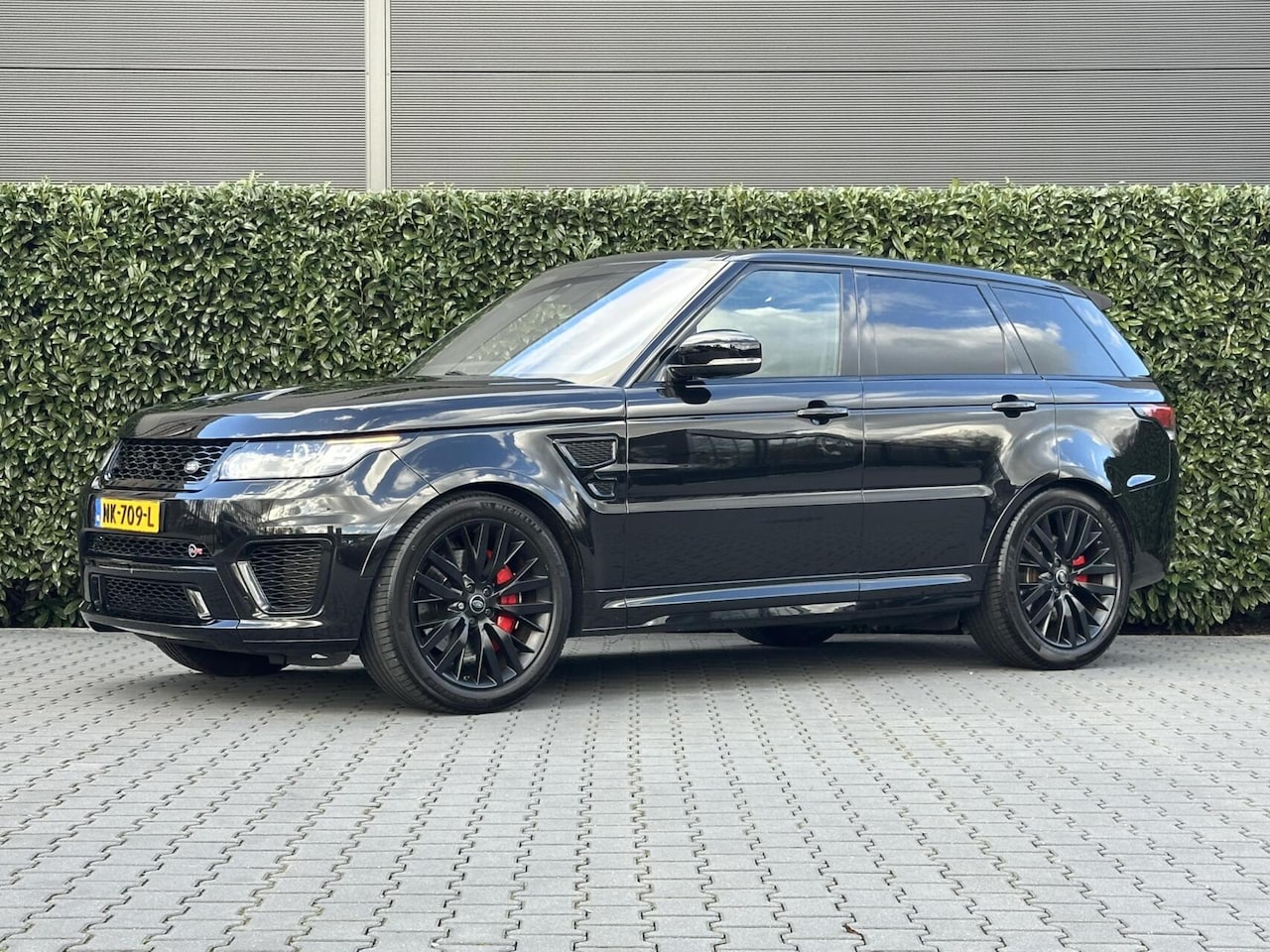 Land Rover Range Rover Sport - 5.0 V8 Supercharged SVR 5.0 V8 Supercharged SVR, PANORAMADAK, MERIDIAN, CARBON, LEDER, ALCANTARA HEMEL, NAVI, LANE - AutoWereld.nl