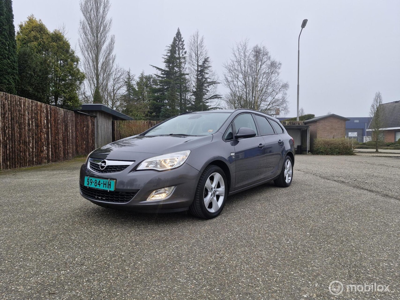 Opel Astra Sports Tourer - 1.4 Turbo Sport 1.4 Turbo Sport - AutoWereld.nl