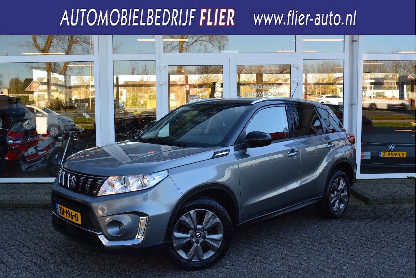 Suzuki Vitara - 1.4 141PK Boosterjet Select ✅ Trekhaak ✅ Clima ✅ Navi ✅ Camera ✅ - AutoWereld.nl