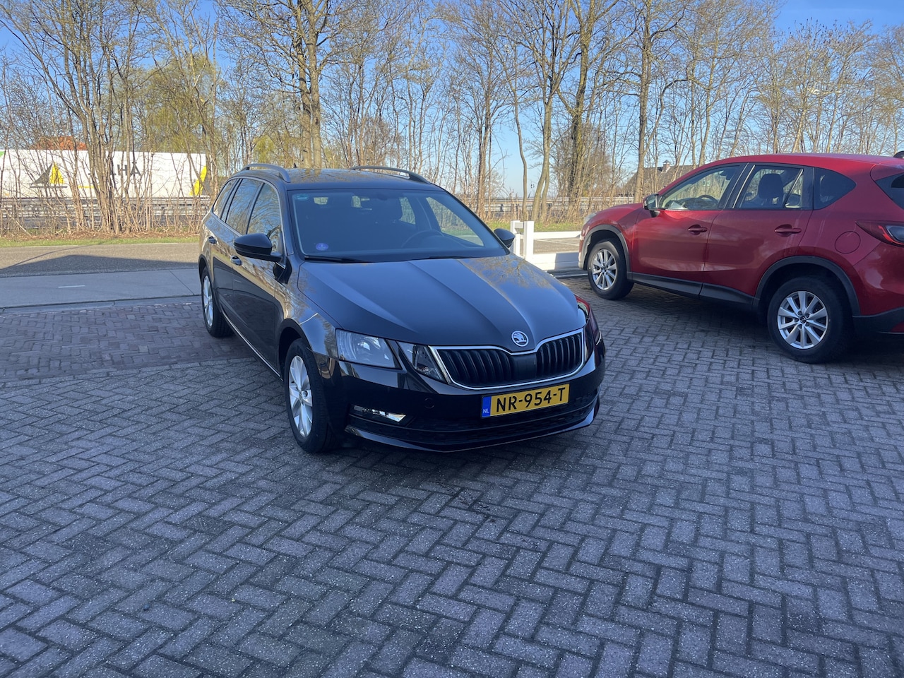 Skoda Octavia Combi - 1.0 TSI Greentech Ambition Business TREKHAAK CRUISE NAVI CARPLAY - AutoWereld.nl