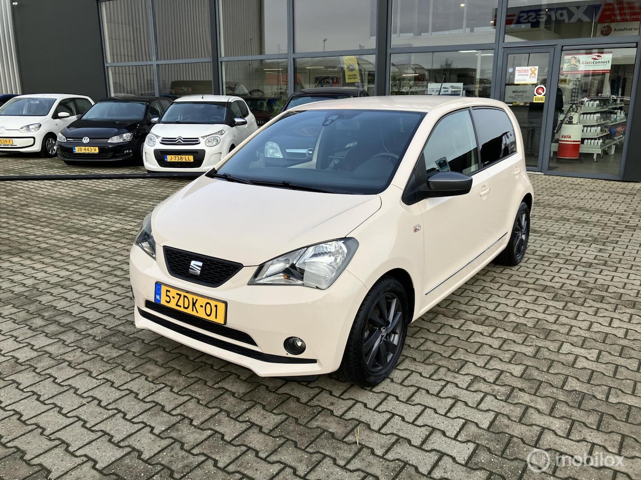 SEAT Mii - by Mango. Navi, PDC, Allseason banden - AutoWereld.nl